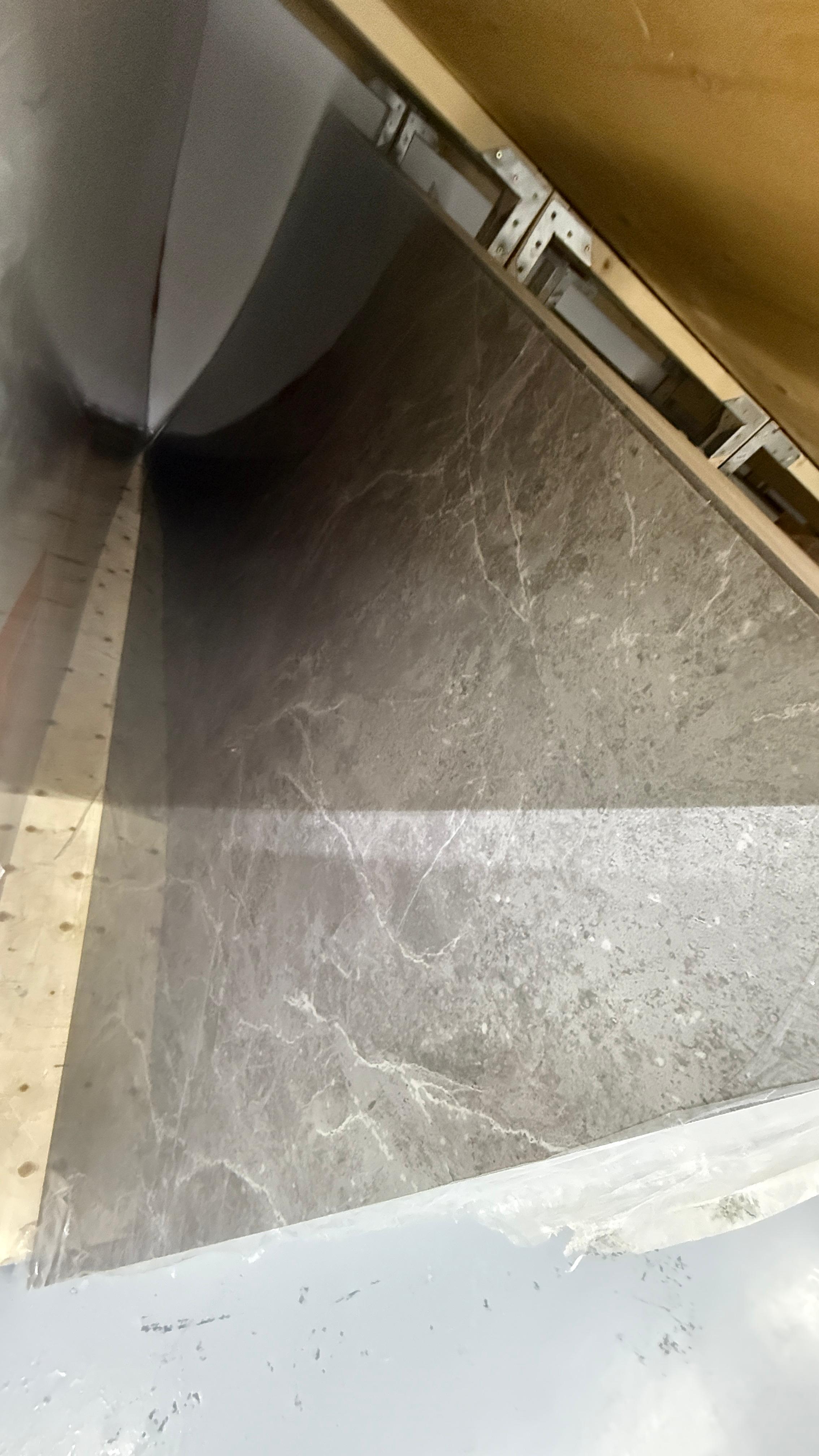 Close-up of a PVC marble Sheet Glossy finish Grey Colour