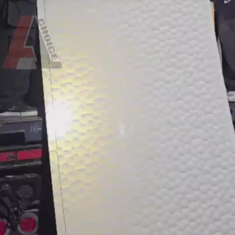 Video Showing Beige marble PVC sheet with gold reflection under light 4x8 ft